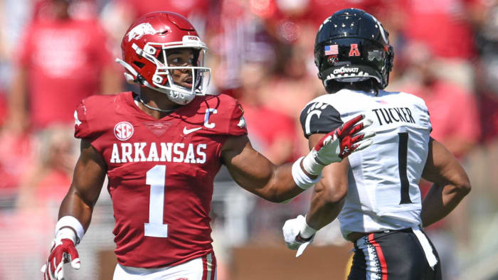 Arkansas safety Jalen Catalon directs the defense against Cincinnati.